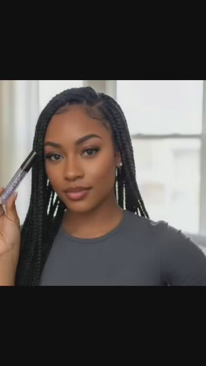 African American woman showing the smudge-proof effect of Brow Lock